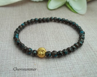 Buddha bracelet gold brown turquoise