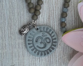 Yoga necklace in wood and glass with polymer clay omer