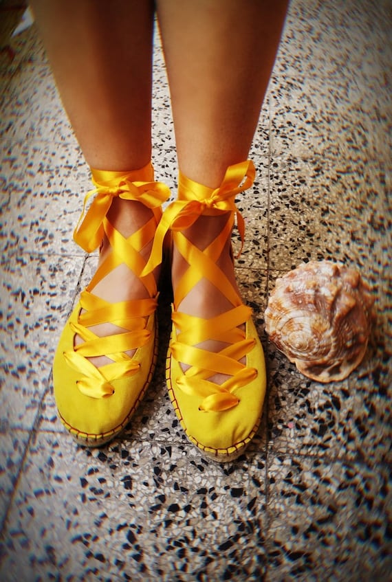yellow tie up shoes