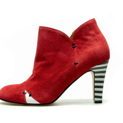 black booties with red heel