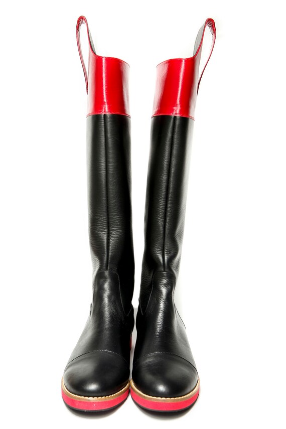 Riding boots deals with red zipper