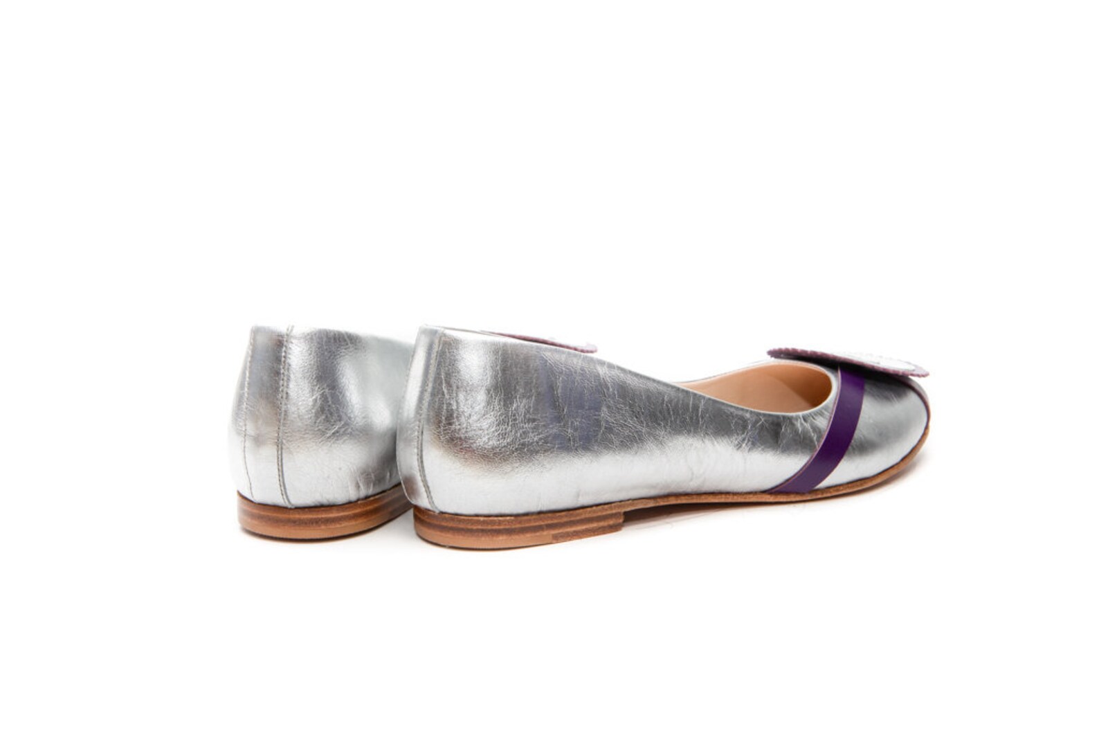 white and silver flats