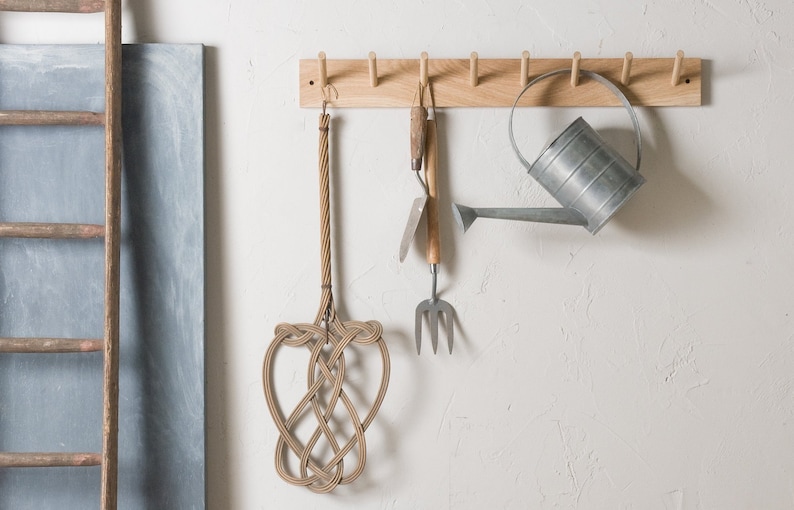 wooden coat peg rail