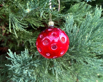 Red Handblown Glass Christmas Ornament with White Inside and Holes to Create Light-effects