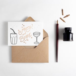 Carte typographique Joyeux Noël et boissons lumineuses