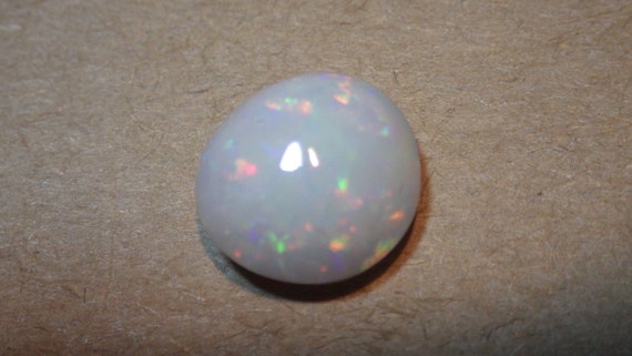 ROUND OPAL RINGSTONE A little taller than some.
