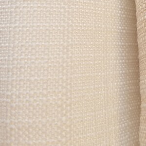 May include: Three different types of white fabric with varying textures. The fabric on the left is smooth, the middle fabric has a subtle texture, and the fabric on the right has a more pronounced texture.