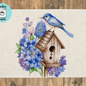 May include: A bluebird perched on a wooden birdhouse surrounded by purple and blue flowers. The birdhouse has a small opening for the birds to enter. The background is a white canvas.