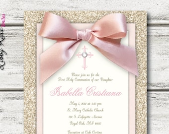 May include: Gold glitter background with a pink ribbon bow and a white cross with a rhinestone. The text reads "Please join us for the First Holy Communion of our Daughter Isabella Cristiana" followed by the date, time, church name, address, reception location, and RSVP information.