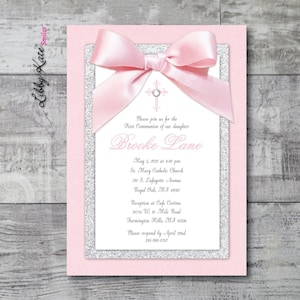 May include: A pink and silver glitter first communion invitation with a pink bow and a silver cross. The invitation includes the name "Brooke Lane" and the text "Please join us for the First Communion of our daughter".