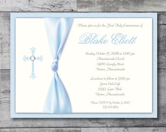 May include: A light blue invitation with a white background and a blue ribbon. The invitation is for a First Holy Communion for Blake Eliott. The invitation includes the date, time, and location of the event, as well as the RSVP information.