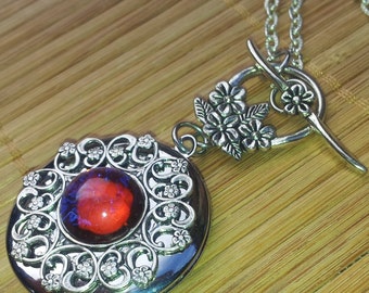 Victorian Filigree Locket Necklace: Dragon's Breath Mexican Opal, Floral Toggle