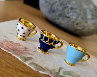 Tiny Teacup Charm: Gold Tone Brass Cup, Blue Enamel, Polka Dot