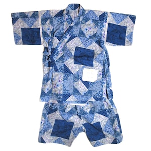 May include: A blue and white patchwork kimono-style robe and matching shorts set. The robe features a wrap-around design with a tie closure and short sleeves. The fabric is patterned with squares and floral designs.