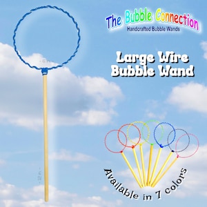 May include: A blue wire bubble wand with a wooden handle. The wand is 12 inches long and the wire loop is 6 inches in diameter. The text "The Bubble Connection" and "Handcrafted Bubble Wands" is at the top of the image. The text "Large Wire Bubble Wand" is in the center of the image. The text "Available in 7 colors" is at the bottom of the image.