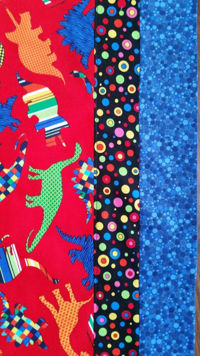 Dinosaur standard size pillowcase. Red background with Etsy