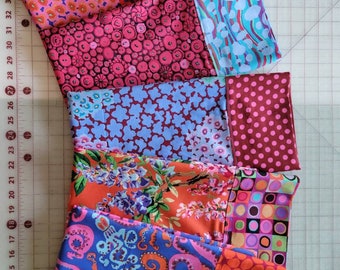 Choose from an assortment of Kaffe Fassett collective pillowcases l. Standard size 28 x 21 inches. Blues, reds and oranges in color