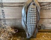 Brass corn knocker