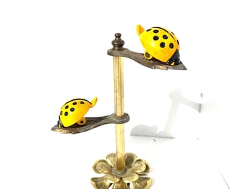 Brass ladybug letter holder