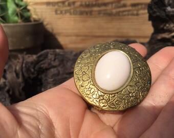 Brass pill pocket container with pink bead