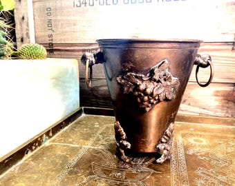 Brass half wine bottle chiller with ornate feet and grapes