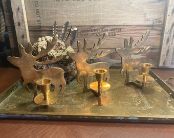 Brass reindeer candlestick holders trio