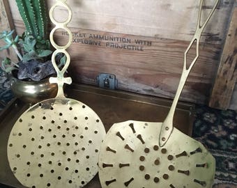 Brass ladel wall decor