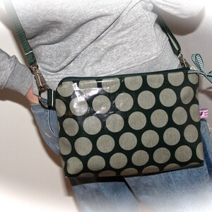 Bolsa clutch em oleado