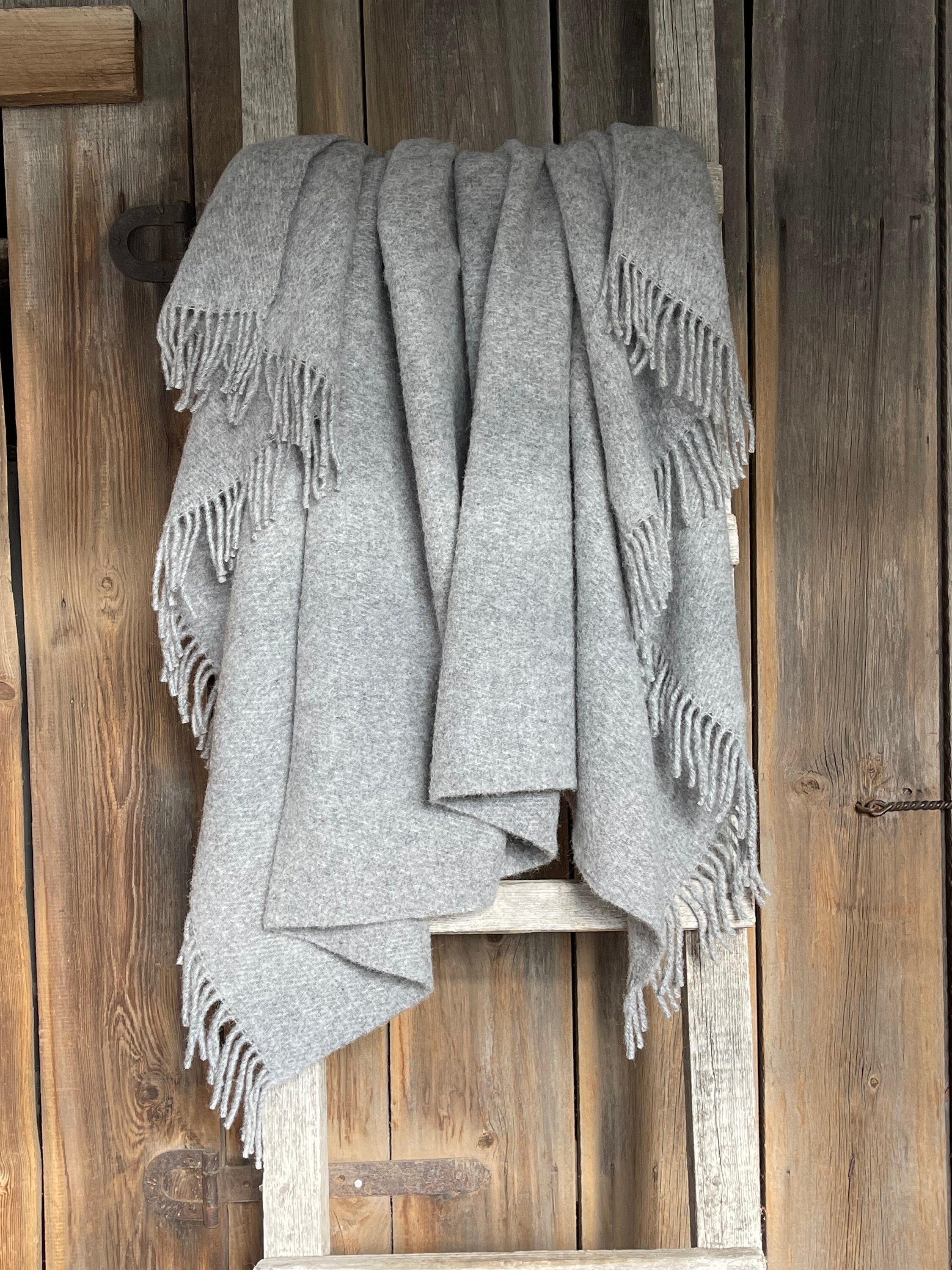 Light grey outlet wool throw
