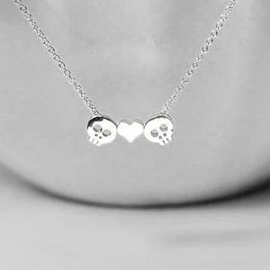 Te amo hasta la muerte, joyería de calavera de corazón, collar de calavera pequeña. Joyería de calavera en miniatura de oro plateado. Collar de calavera delicada. Encanto de calavera pequeña