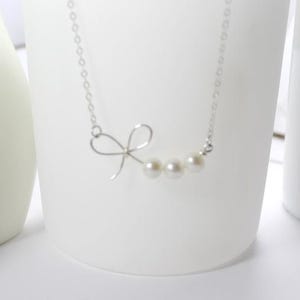 Regalo de joyería para dama de honor: collar de pajarita, regalo de cinta, pulsera de nudo. Pulsera de nudo de eternidad con perlas de agua dulce. Regalo de boda. imagen 1