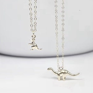 Dinosaur necklace, T-Rex pendant, Prehistoric jewelry, Jurassic charm necklace, Dino lover necklace, Dino-themed necklace, Ancient reptile