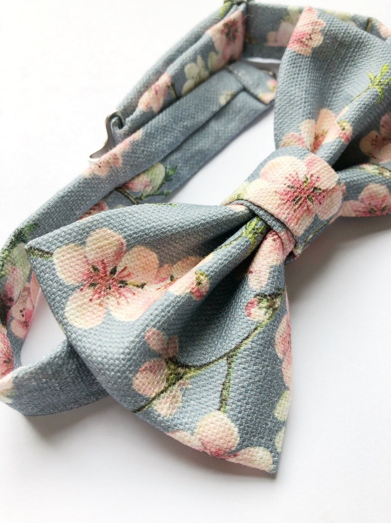 Mens cherry blosom bow tie, in bluey grey linen with a pink floral print. image 4