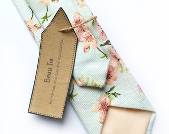 Mens floral tie, handmade using duck egg blue linen with pink cherry blossom print.