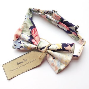 Mens vintage floral bow tie, handmade using dark blue/indigo vintage cotton with a large rose print.