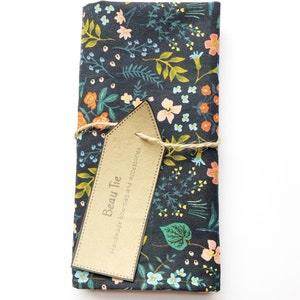 Mens navy blue pocket square with floral print in coral and blush