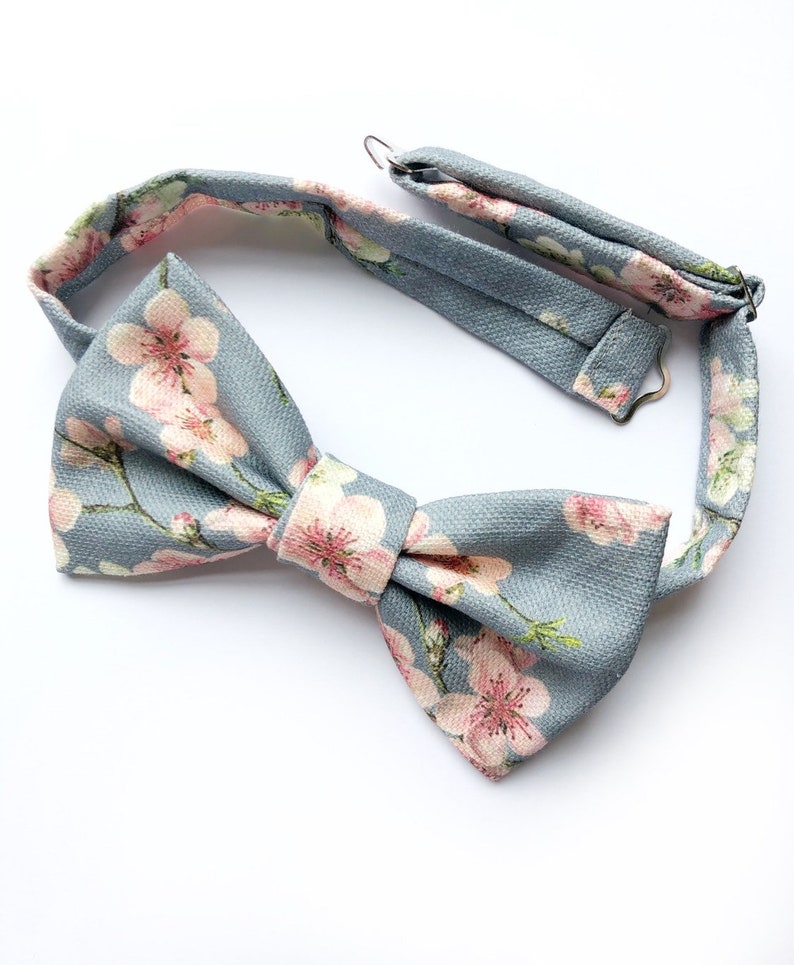 Mens cherry blosom bow tie, in bluey grey linen with a pink floral print. image 2