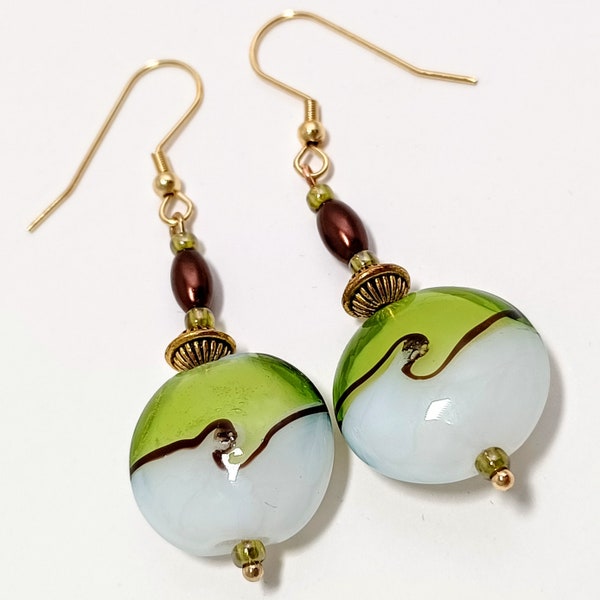 Green and white wave dangle earrings; gold tone earwires