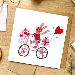 Bunny Cycling Valentine's Card (148mm x 148mm) Rabbit, Bike, Cute, Love, Valentine, Sweet Illustration, Drawing, Flowers, Blank, Cyclist image 1