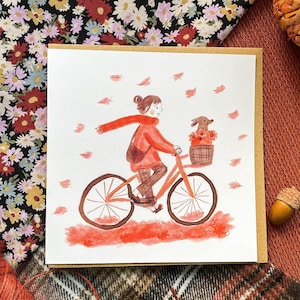 秋のサイクリストとダックスフントのグリーティングカード（148 mm x 148 mm）自転車のグリーティングカード、イラスト、ダックスフント、秋、自転車、ソーセージ犬、かわいい、空白