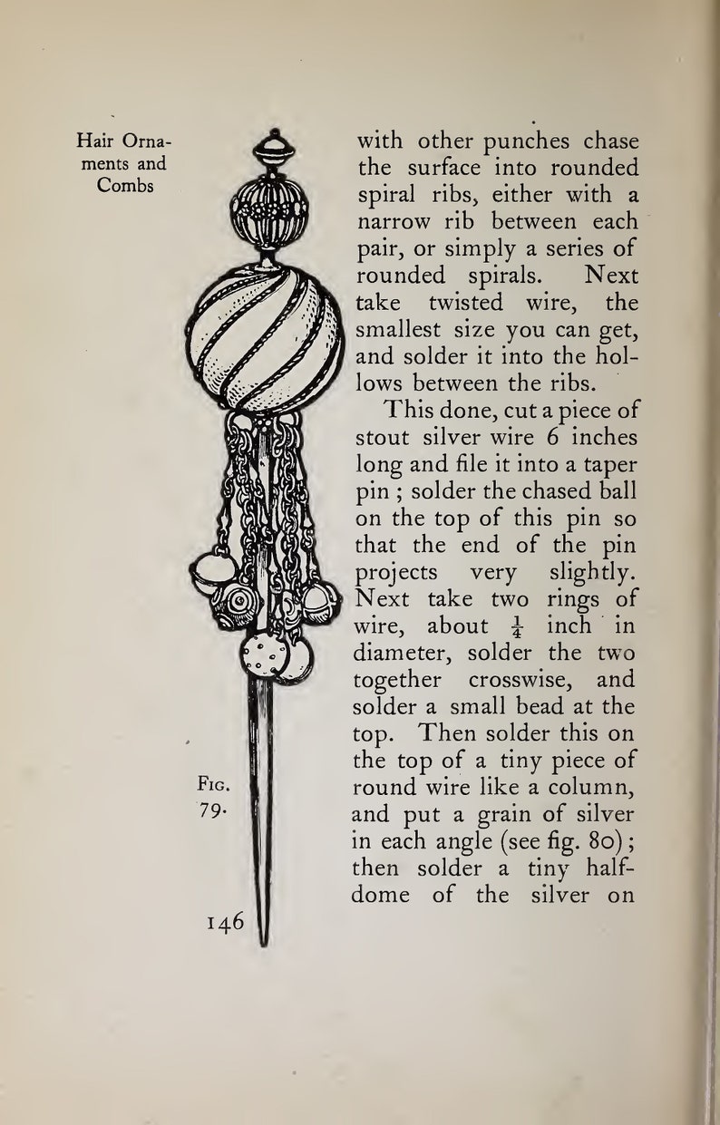 May include: A detailed illustration of a hair ornament or comb. The ornament is made of silver wire and features a chased ball on top, followed by two rings and a small bead. The ornament is attached to a long, thin silver pin.