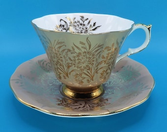 Queen Anne tan and gold carnation tea cup and saucer, Vintage English teacup