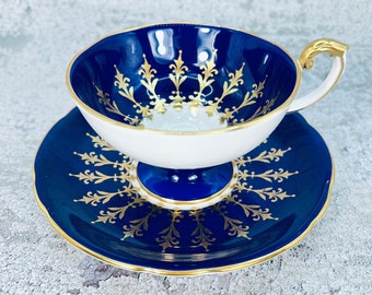 Vintage Aynsley cobalt blue and gold pedestal tea cup and saucer set, English tea party