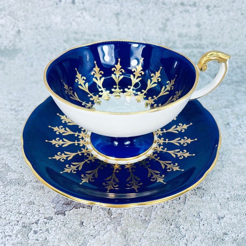 Vintage Aynsley cobalt blue and gold pedestal tea cup and saucer set, English tea party image 1