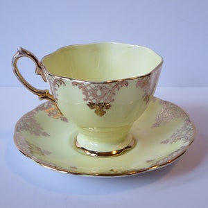 PORCELAIN TEACUP~ Royal Albert~ Tea cup and saucer~ Yellow and Gold~ Vintage Collectible cup~ Tea coffee service~ Cabinet Cup~ Ornament