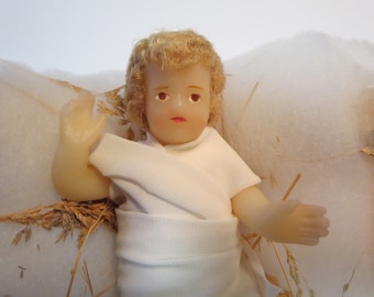 CHRISTMAS ORNAMENT~ Manger~ Nativity~ Wax Jesus statue~ Catholic religious~ Baby Jesus enfant 5 1\2 Inches~ Church Crib~ Statue~ Home decor
