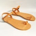 see more listings in the Toe ring sandals section