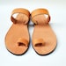 see more listings in the Toe ring sandals section