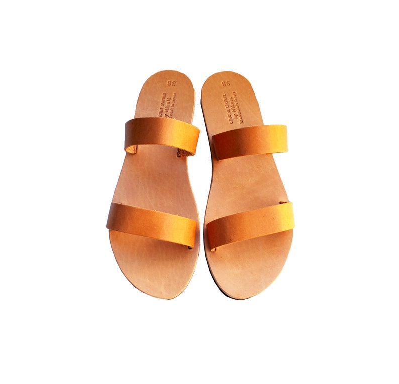tan and black slingbacks