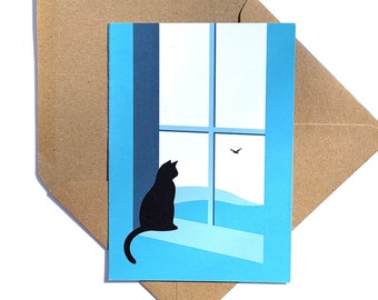 May include: A blue and white card with a black cat sitting by a window looking out at a bird flying in the sky. The card is in a brown envelope.